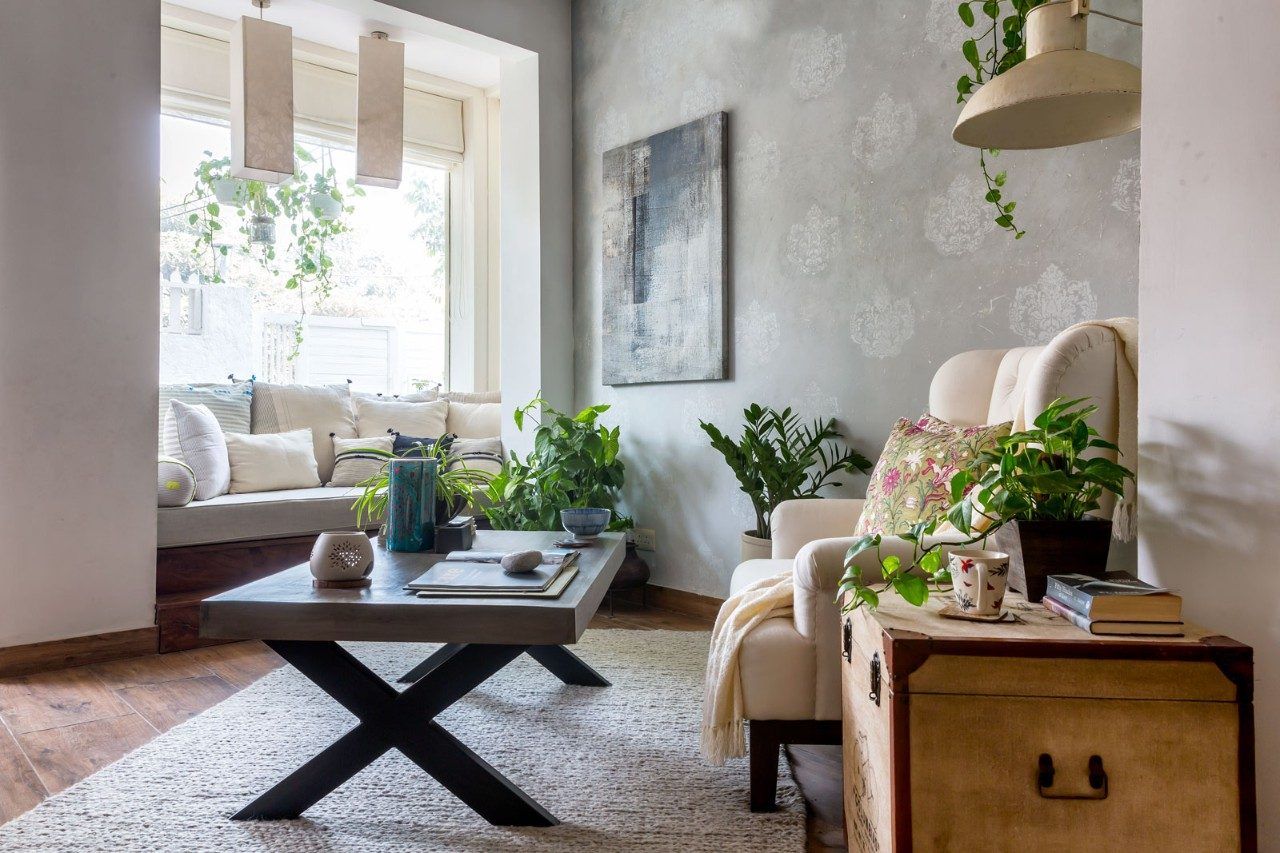 The living area has a cosy alcove fitted with plush cushions - Beautiful Homes