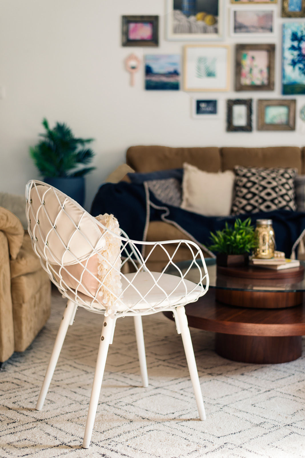 The white wireframe chair not only adds additional seating - Beautiful Homes