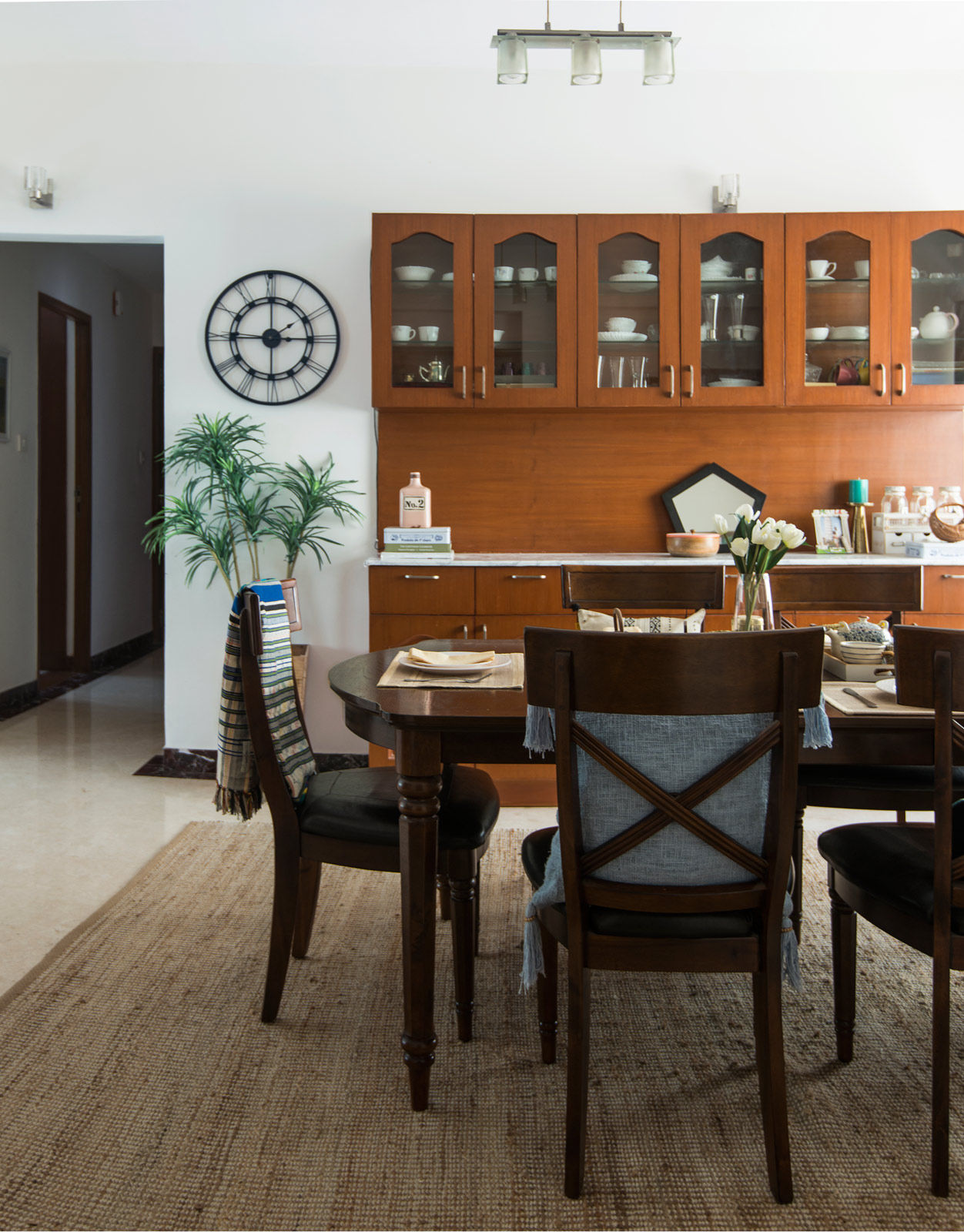 The dining area flooring is coverd with a large carpet - Beautiful Homes