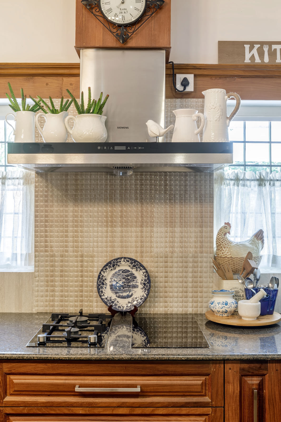 The kitchen dressed up with some quirky décor accents - Beautiful Homes