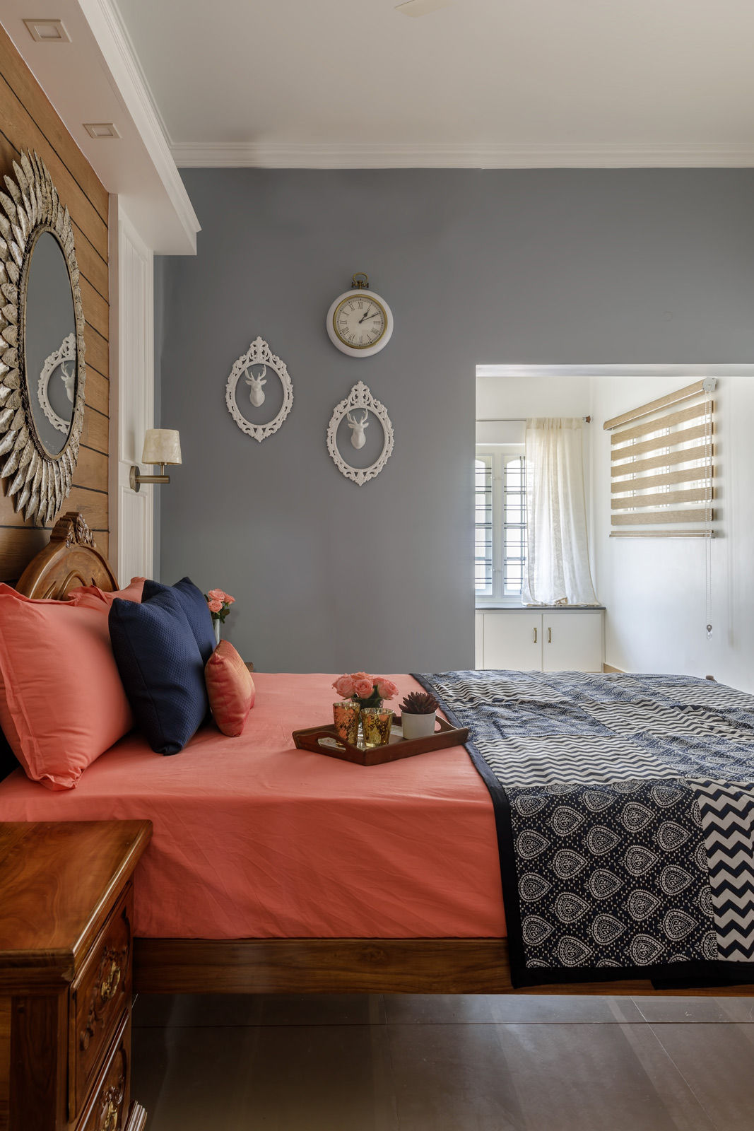 The bedroom channels the beach vibe with its light grey walls - Beautiful Homes