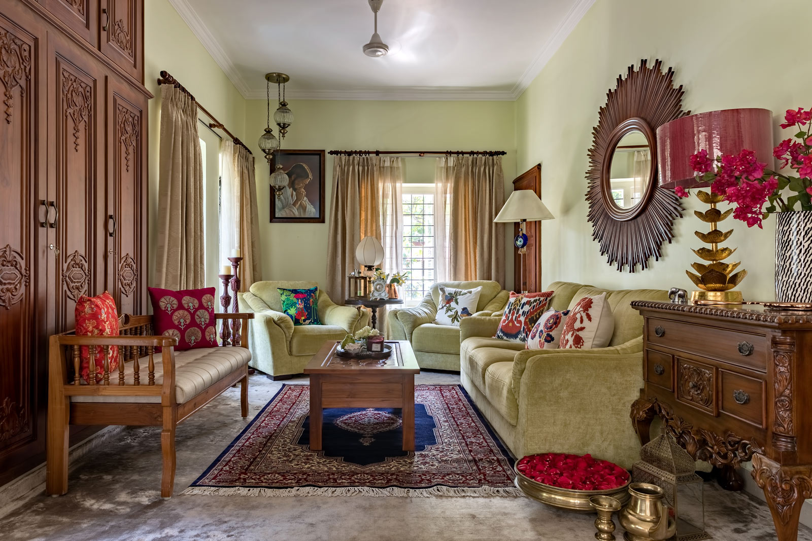 A living room with a mix of traditional and modern elements in Kerala home - Beautiful Homes