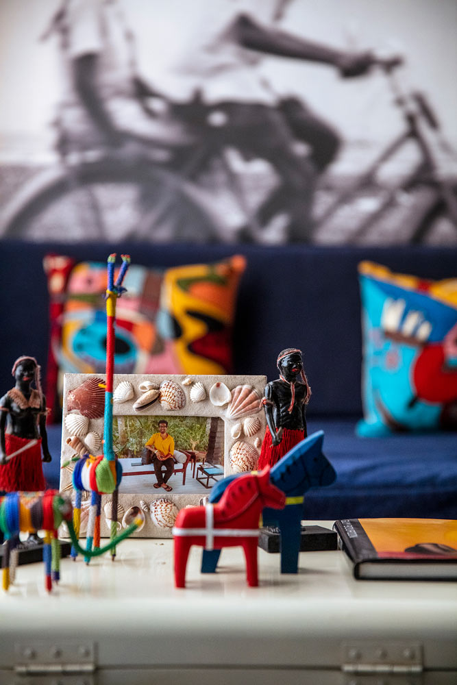 A photo frame from Andaman and Nicobar Islands & home décor elements in the living room - Beautiful Homes