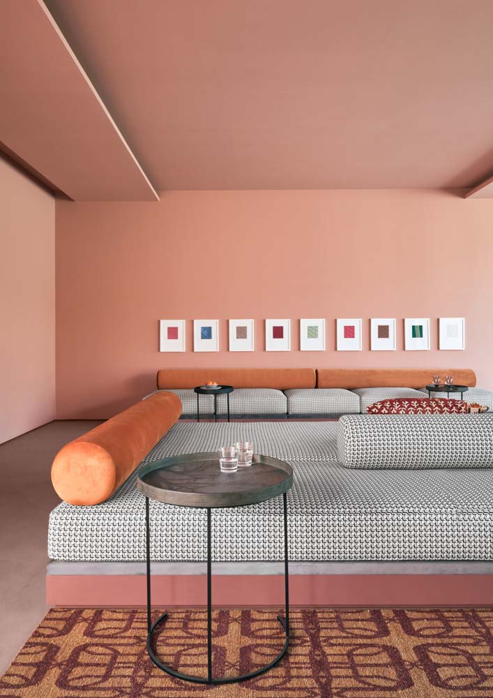 Minimalist living room design with diwan, custom artwork wall decor & side tables - Beautiful Homes