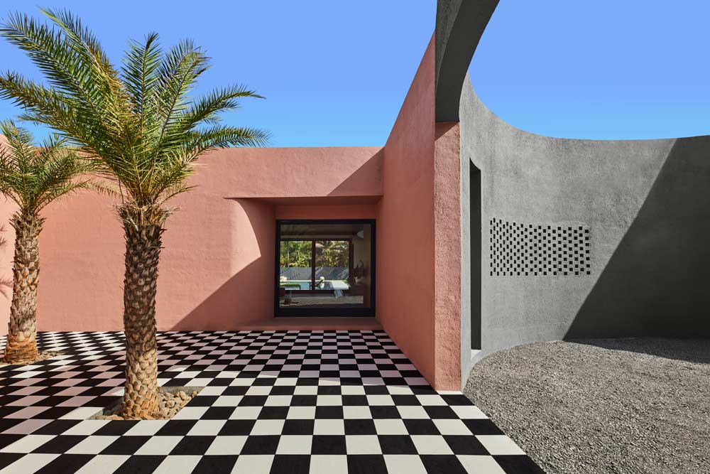 Outdoor of the spacious villa design has patterned chess flooring - Beautiful Homes