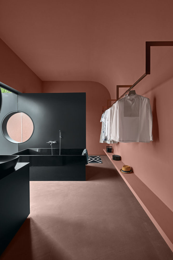 Pinakin Patel's villa design has a red-pink colour palette with dark décor items & interiors - Beautiful Homes