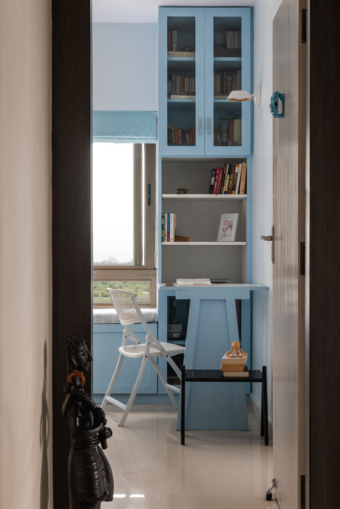 Folding study table for guest room-cum study room in sky blue colour - Beautiful Homes
