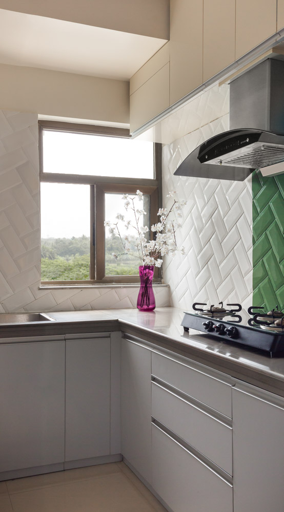 Herringbone-patterned tiles with granite and Marmara marble for kitchen - Beautiful Homes