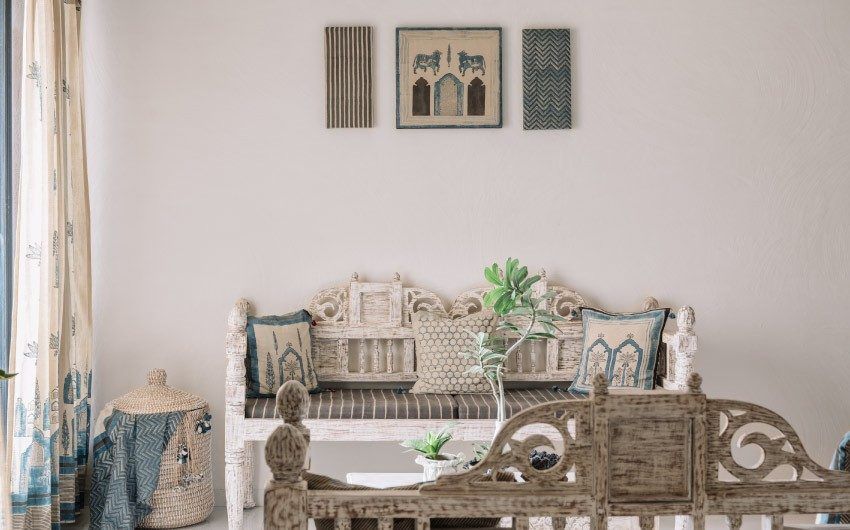 living area done using breathable off-white and blue fabrics