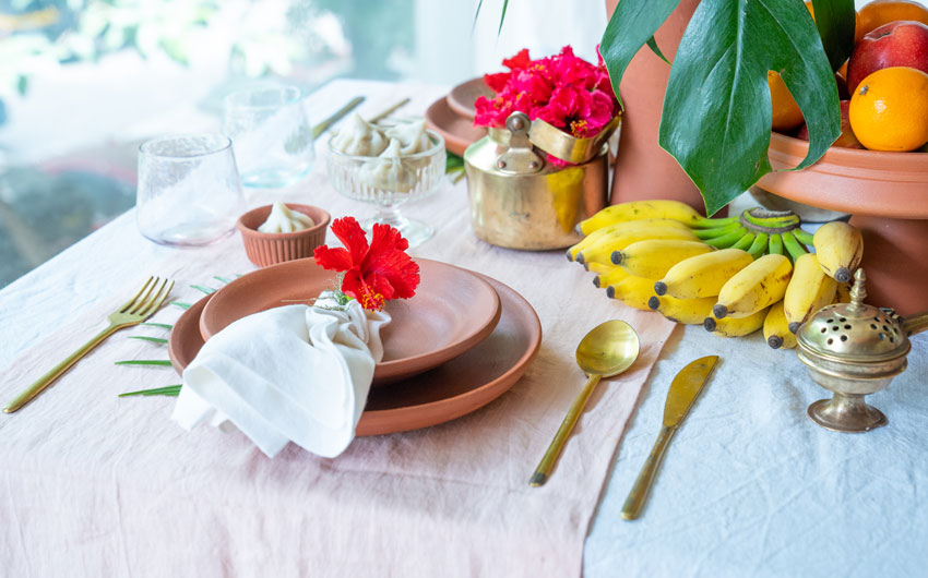 Table decoration for Ganesh Chaturthi with traditional copper pooja items & offerings - Beautiful Homes
