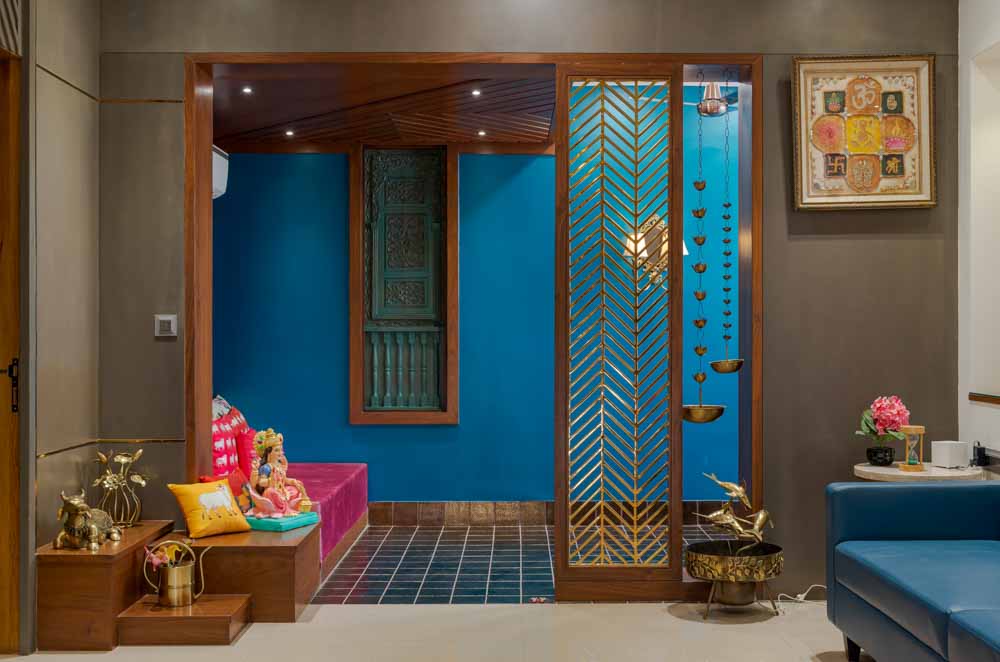 Space Saving Pooja Room Design With an Idol, Wind Chines & Bells Hung  - Beautiful Homes