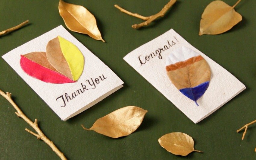 DIY leaves art for gift cards on green background