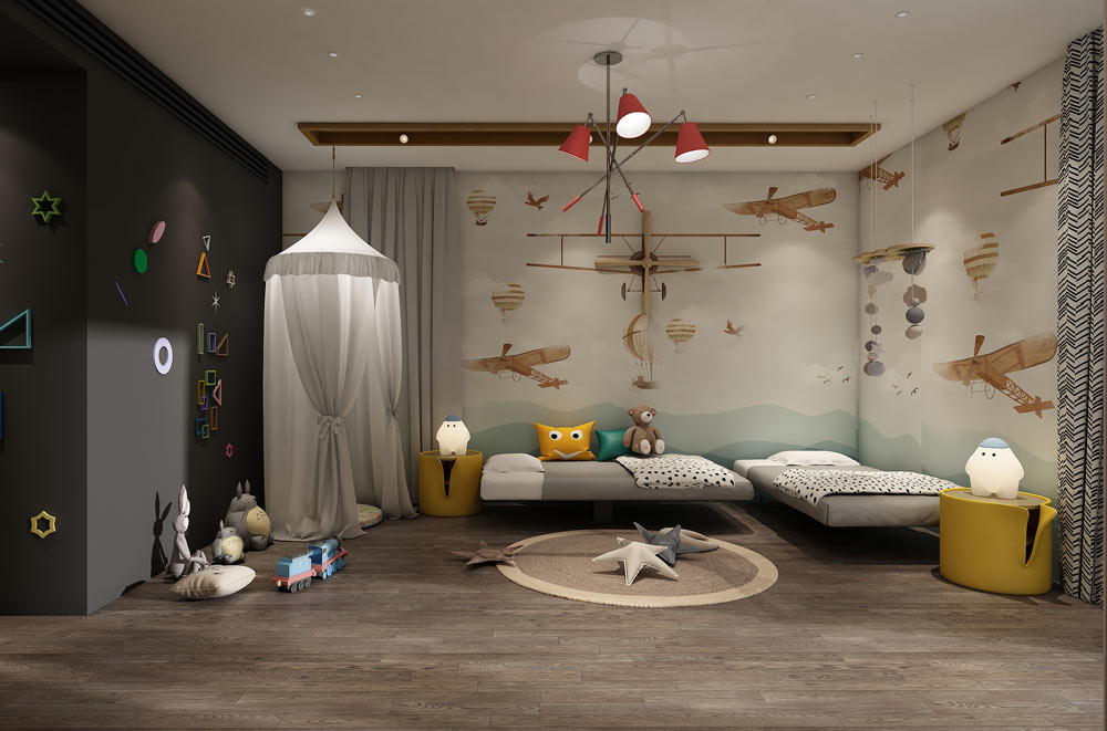 A kids room with two beds, a round rug, a white wall with airplanes painted on them