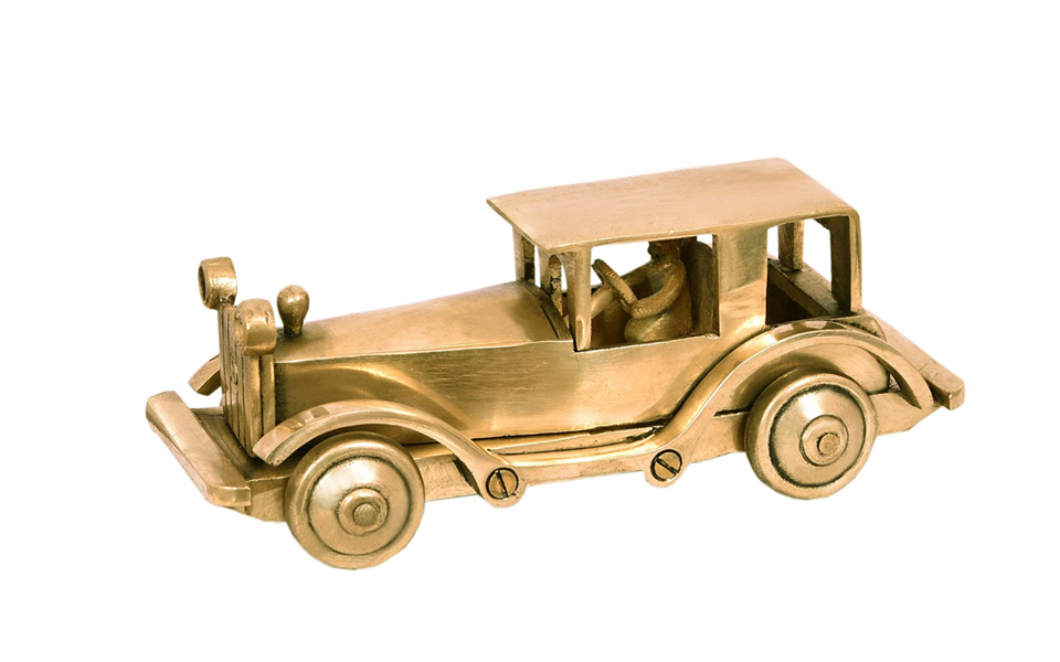 Gold Accessories Design With Vintage Car For Your Centre Table - Beautiful Homes