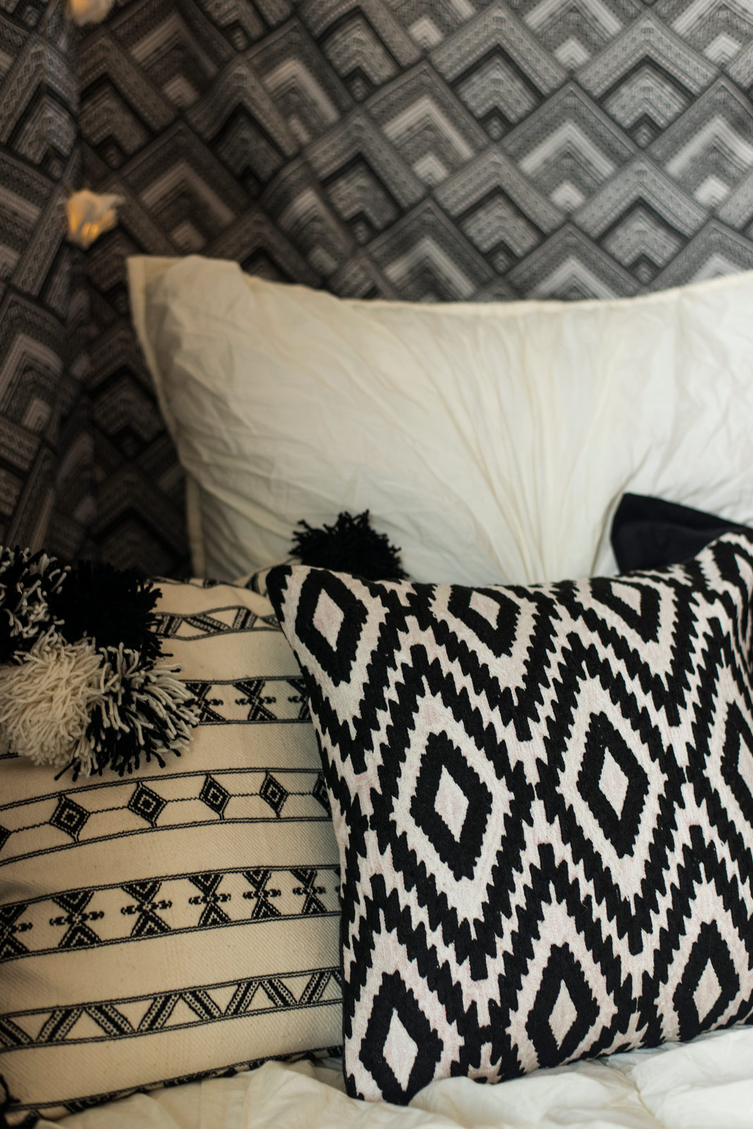 Small Monochromatic Bedroom Design in Black & White Colour Combination With Textures & Patterns - Beautiful Homes