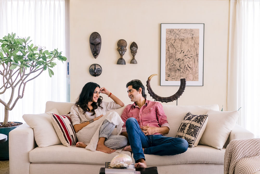Gaurav Kapur and Kirat Bhattal lounging in their living room