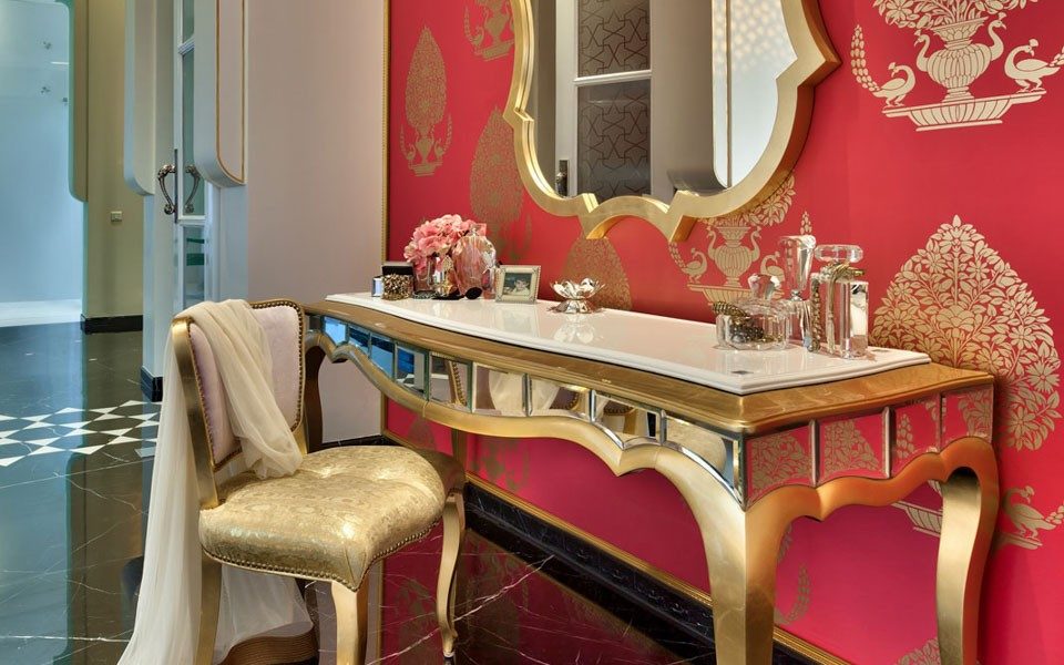 interior design with a combination of red and gold
