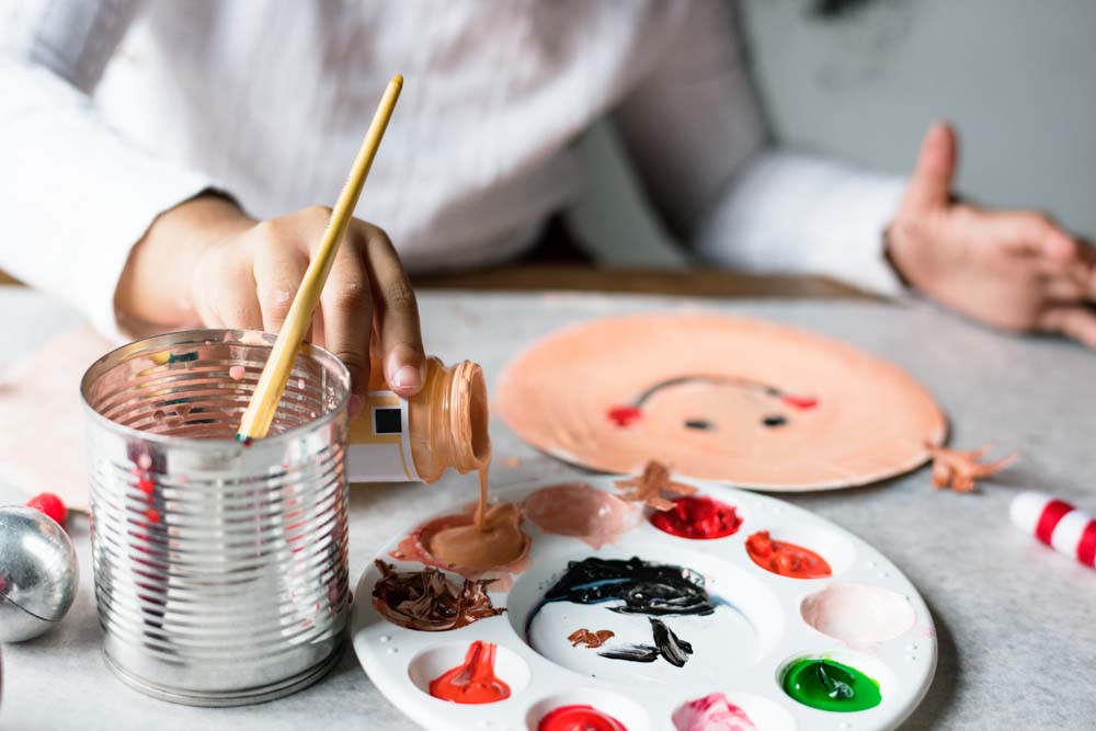 Kids painting on a table