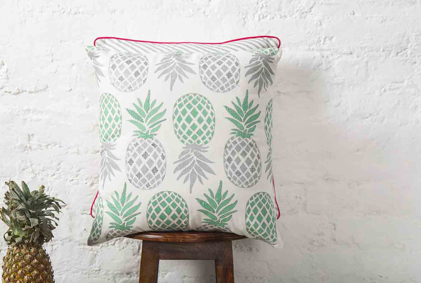a cushion with pineapple fruit print