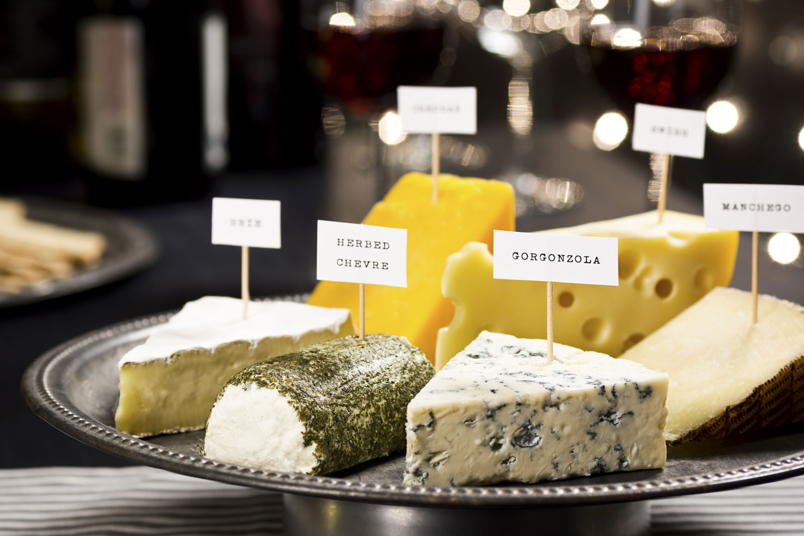 Markers to identify different varieties of cheese on the plate - Beautiful Homes