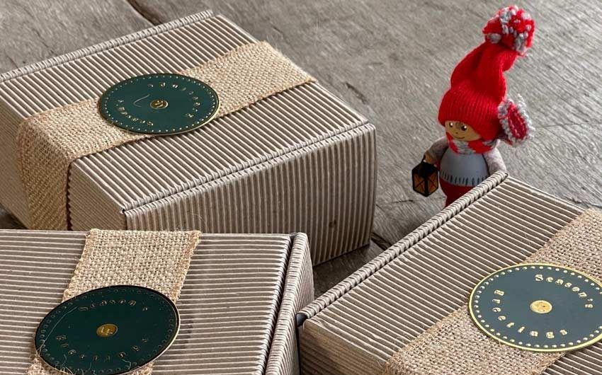 Boxes of cake along with a red figurine