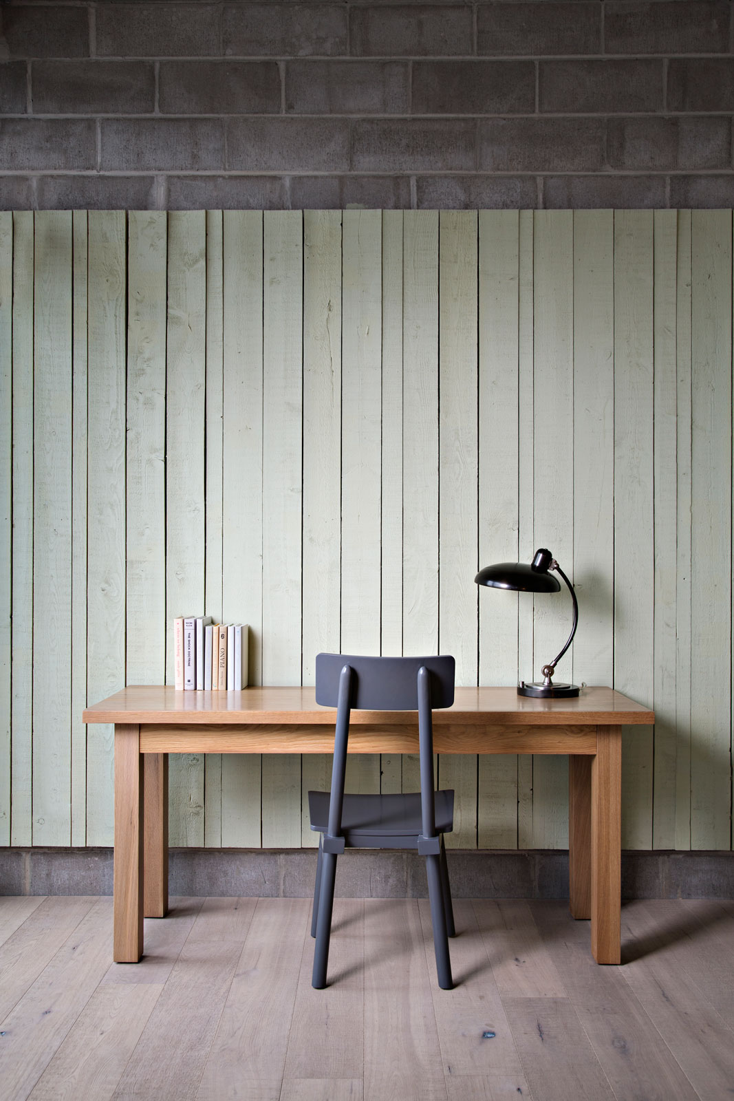 The desk set up against a panelled wall at the Boro Hotel in New York – Beautiful Homes
