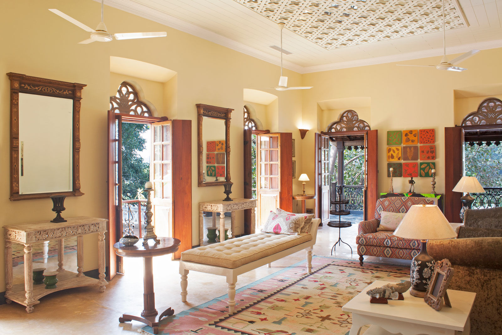 Centre and side tables provide ample space to show-off the antique collections - Beautiful Homes