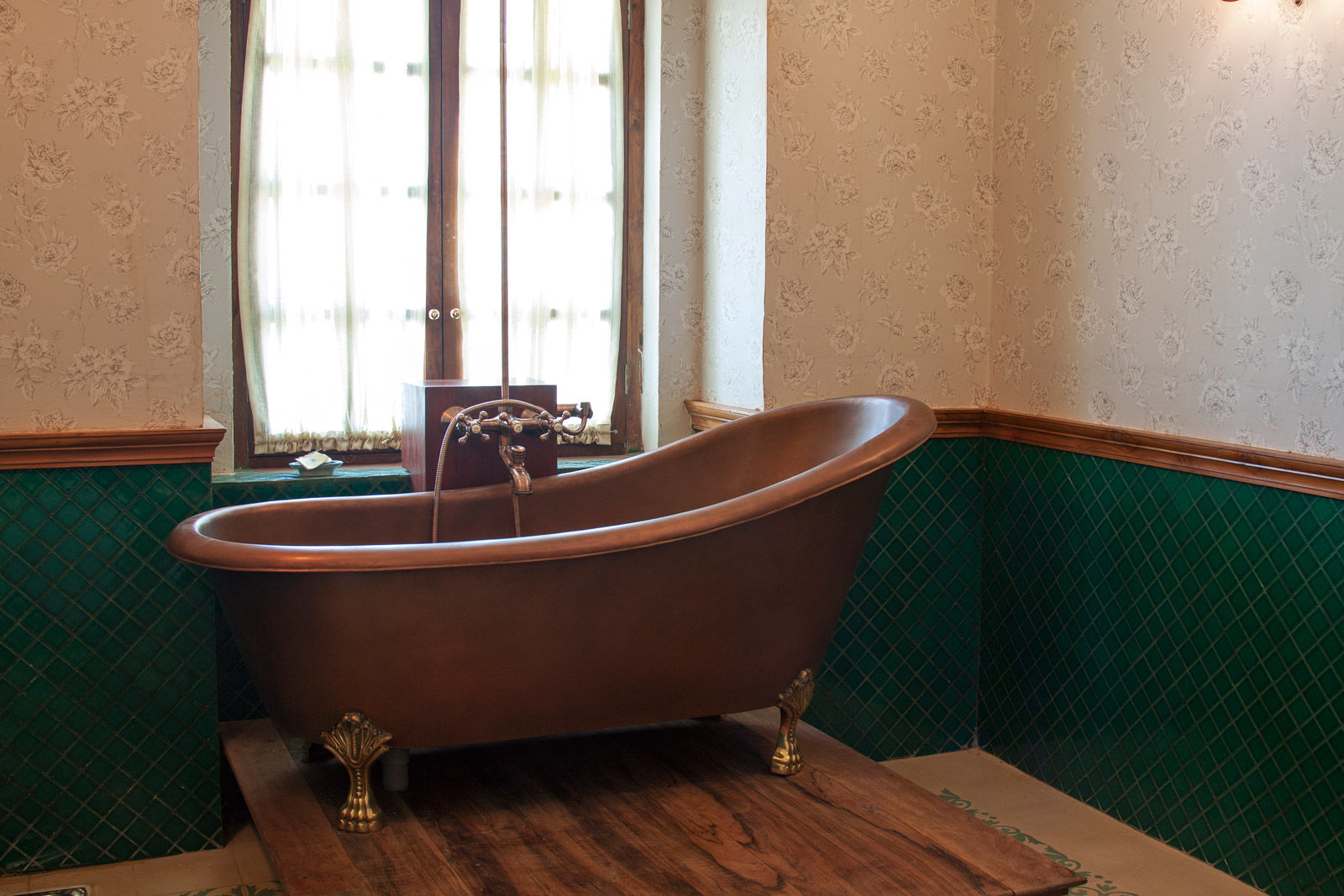 A bathroom with a combinations such as tiles, wood, wallpaper and even marble - Beautiful Homes