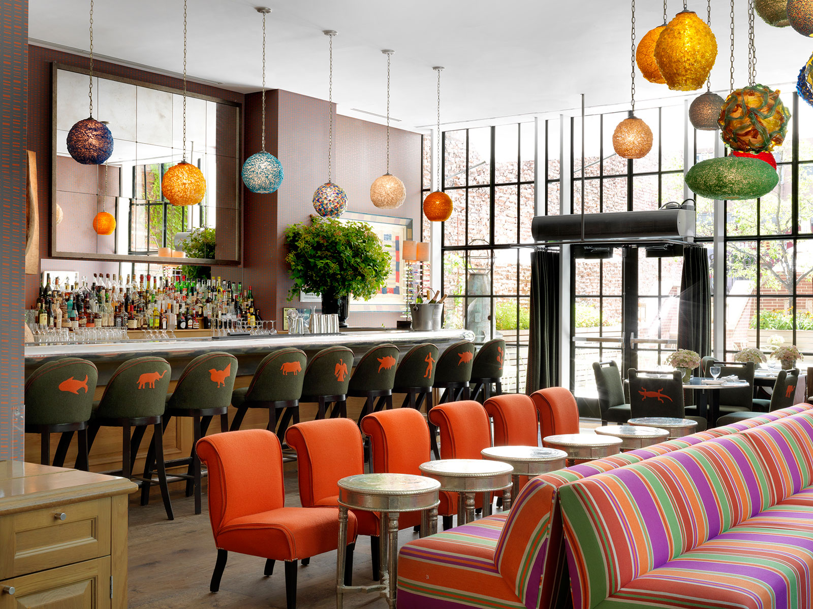 The sprawling Bar with its high ceiling and a long pewter counter at the Crosby Street hotel in New York – Beautiful Homes