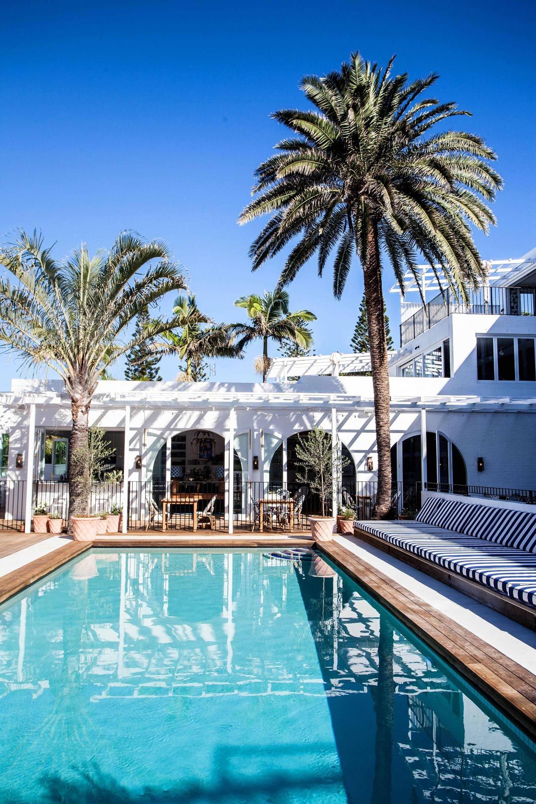 The all white exteriors at the Halcyon House in Australia