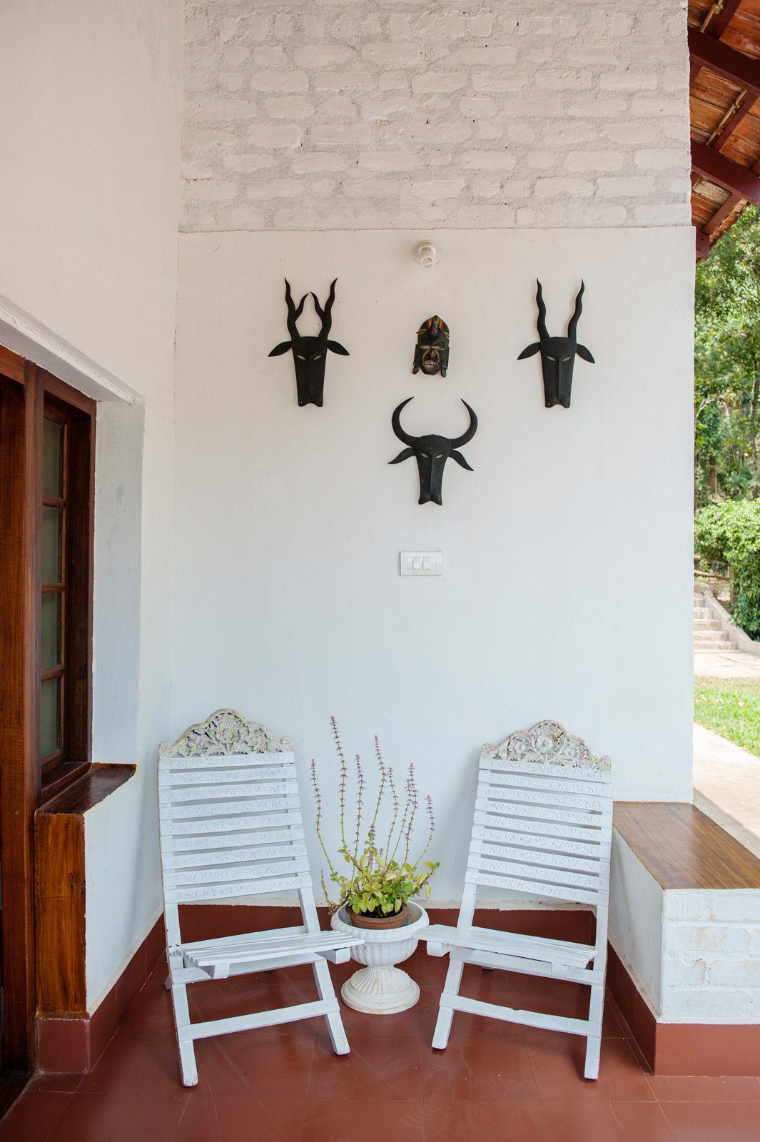 A porch with beautiful wall hangings - Beautiful Homes