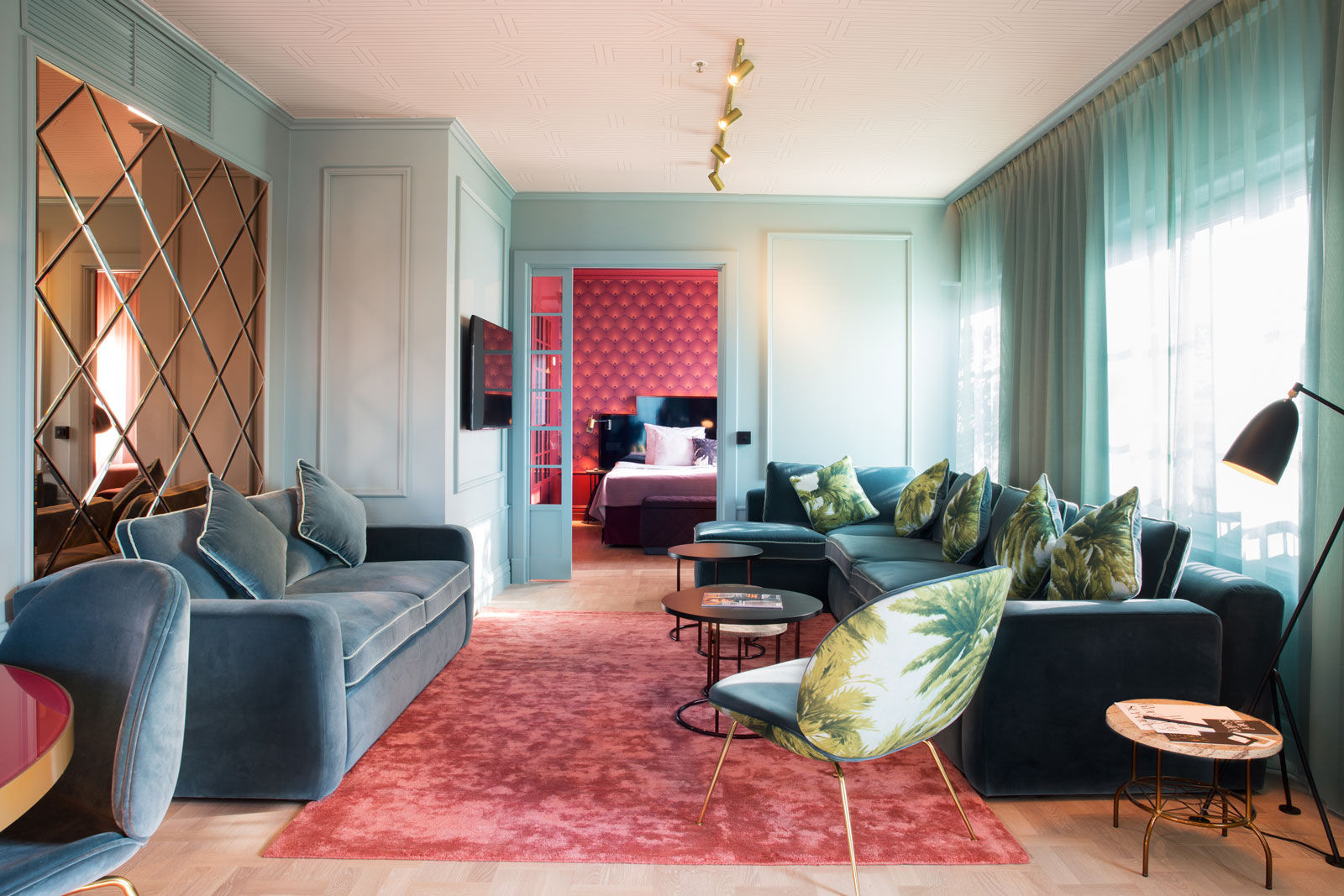 The interiors of Scandic hotel is decorated with geometric patterned wallpaper, the Beetle chair - Beautiful Homes