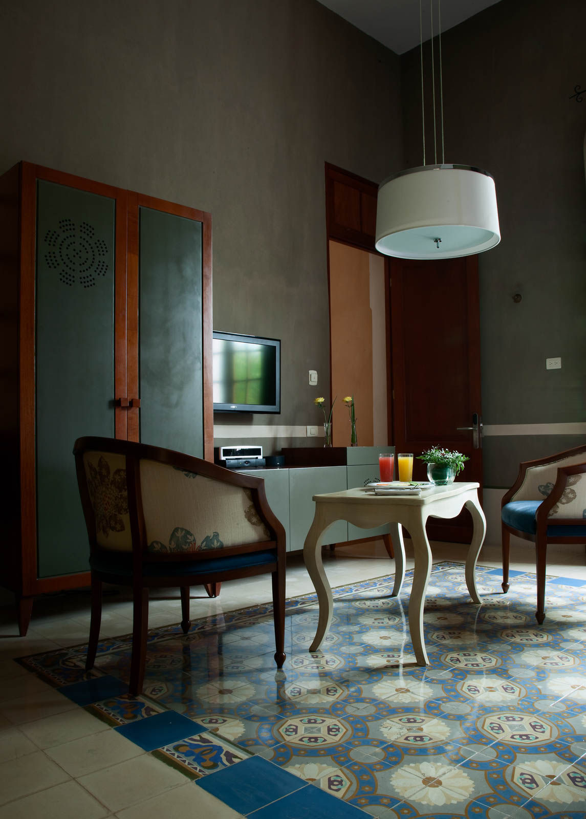 Traditional Mexican floor tiles at the Rosas & Xocolate Hotel - Beautiful Homes