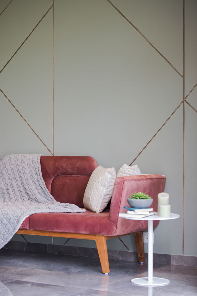 A lounge sofa in dark mauve