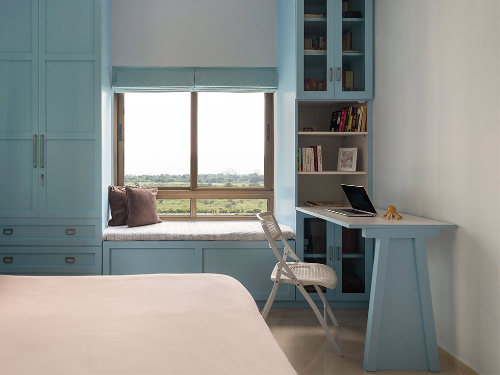 a bedroom with minimal with calming colours