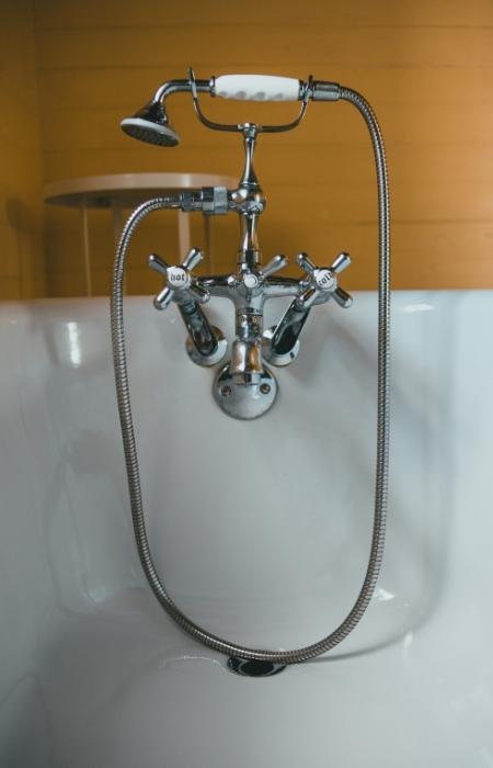 Handheld shower head for modern bathroom interiors - Beautiful Homes