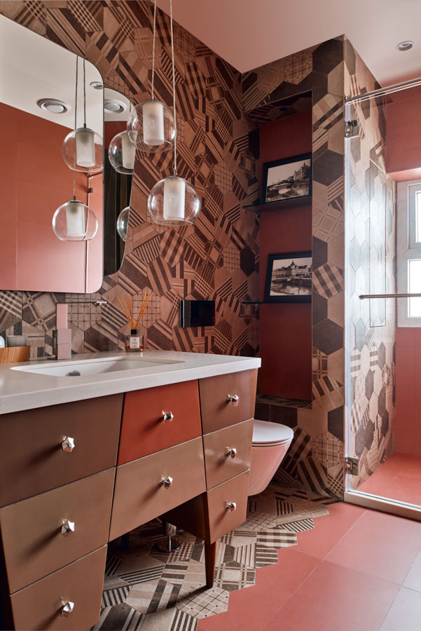 Bathroom ceiling lights in clear acrylic domes, mix of prints, colours and textures for the rest of the room