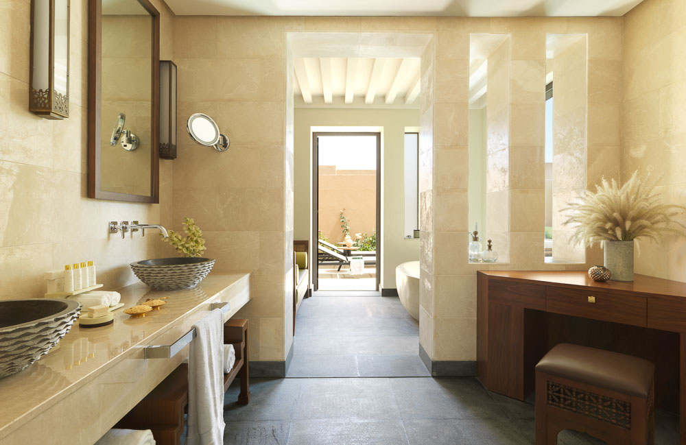 Open Bathroom Design with Glossy Ceramic Tiles & Wooden Furniture, Concrete Floor & Door Giving To the Outdoor - Beautiful Homes