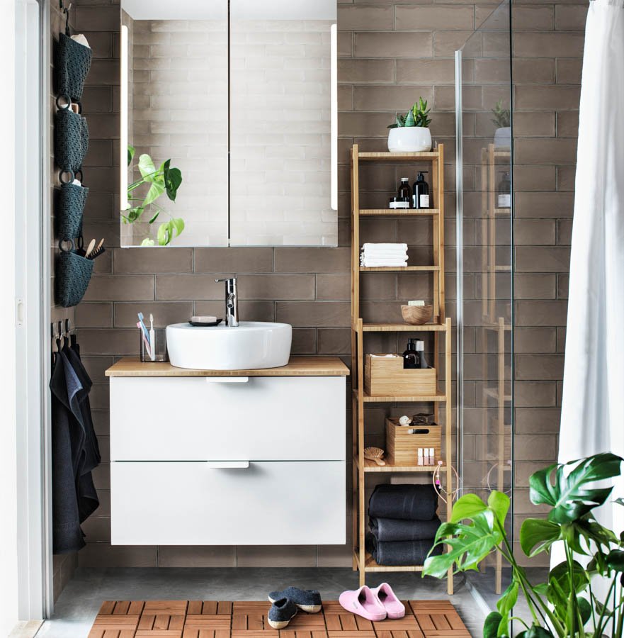 Walls used to make floating shelves & hanging hooks for bathroom storage - Beautiful Homes