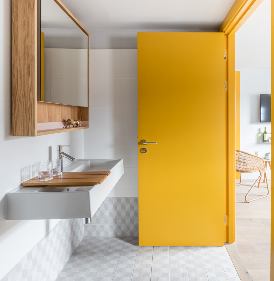 Bright yellow small bathroom design with mirror - Beautiful Homes