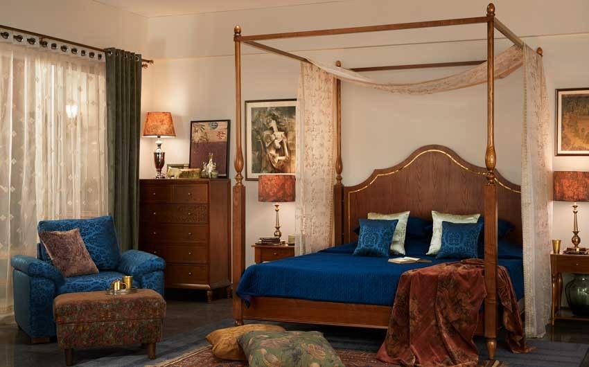 Bedroom with a wooden four poster bed