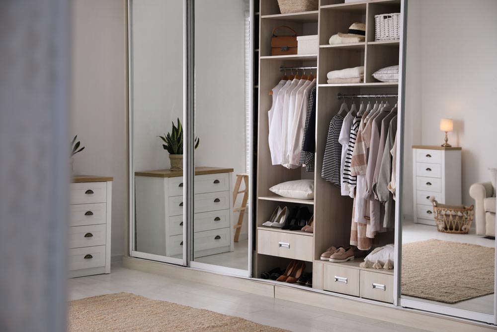 Mirrored wardrobe design with sliding door for a small bedroom design - Beautiful Homes