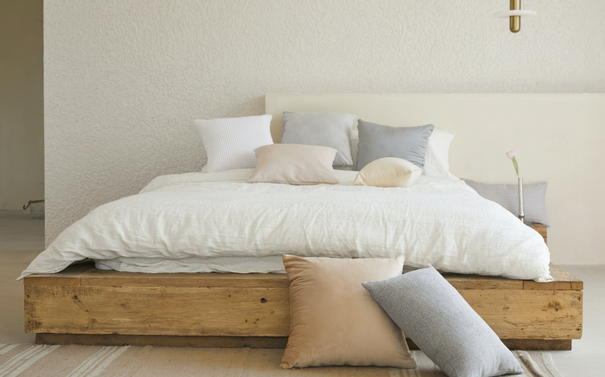 Combine white mattress with pastel cushions for your home - Beautiful Homes