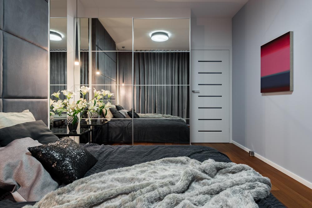 Mirror panels in modern bedroom cupboard design for big bedroom interiors - Beautiful Homes