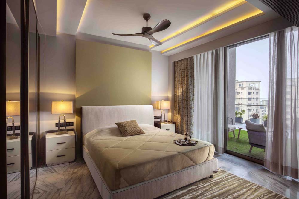 Multi level tray shaped bedroom ceiling design with cove lighting - Beautiful Homes