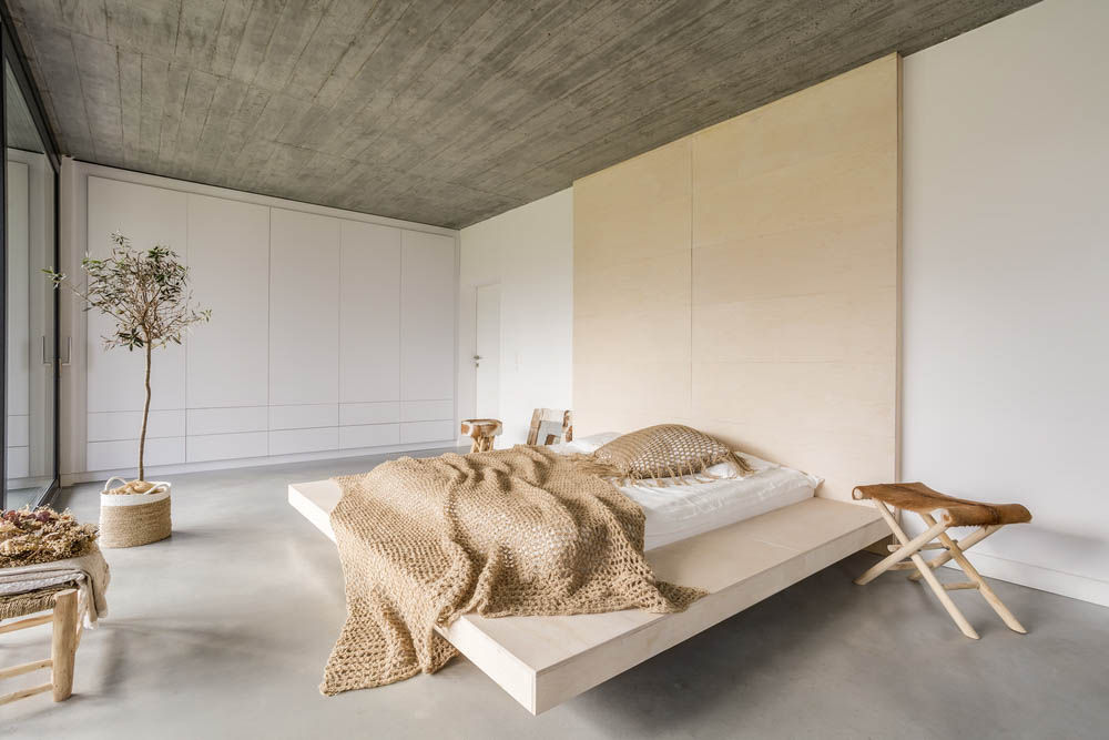 Concrete finish and wood panels bedroom POP design - Beautiful Homes