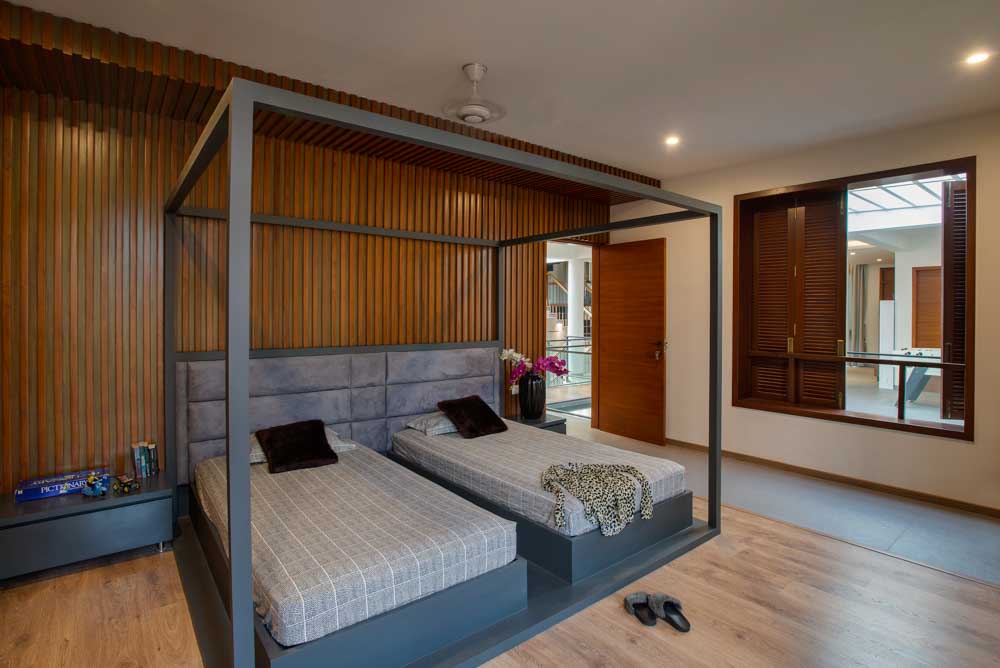 Use combination of wooden & tiles flooring in your bedroom interior design - Beautiful Homes