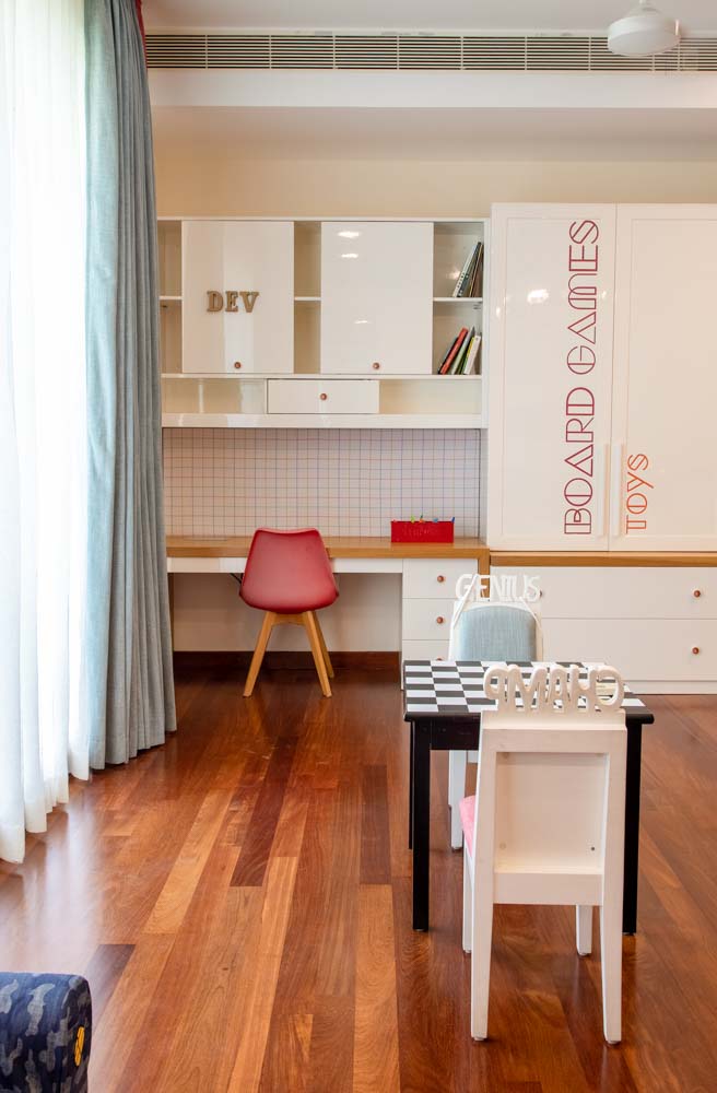 A grey wall with led signs on it