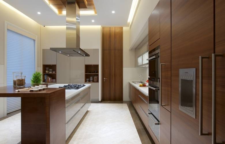 Steel kitchen chimney with lighting for island - Beautiful Homes