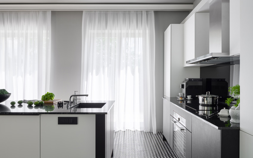Use simple white translucent curtains to let in natural light in the kitchen - Beautiful Homes